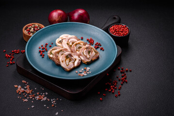 Delicious meatloaf with lard, salt, spices and herbs cut into slices