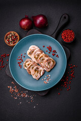 Delicious meatloaf with lard, salt, spices and herbs cut into slices