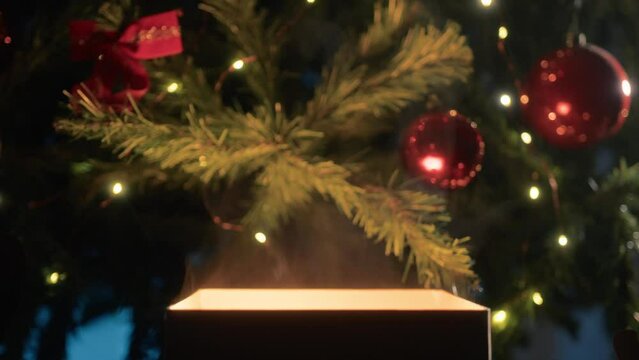 Mysterious Christmas gift box under the tree 