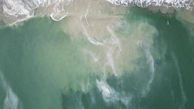 Drone view of East Looe Beach in Cornwall, England, United Kingdom