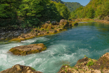 The River Una at the bottom of Strbacki Buk, a terraced waterfall on the border between the Federation of Bosnia and Herzegovina and Croatia. Early September