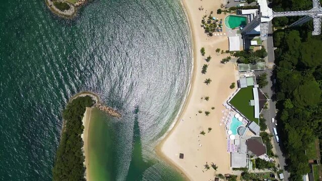 Top-down aerial view of a beach on Sentosa Island in Singapore