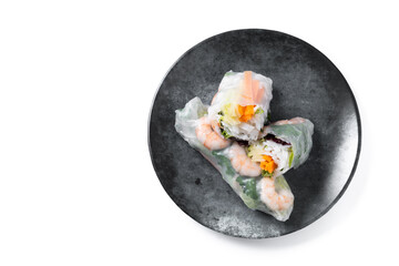 Vietnamese spring rolls with vegetables, rice noodles and prawns isolated on white background. Top view. Copy space