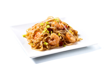 Pad Thai with shrimp and vegetables isolated on white background. traditional thai food