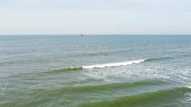 Sailing boat near the beach in the Netherlands.