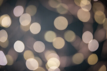 Delicate bokeh on a dark background.
Abstract bright bokeh on a dark background.
Abstract christmas background with bokeh. 
Abstract background with bokeh.