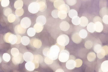 Fototapeta premium Abstract light bokeh background. Abstract bokeh on a light purple background. Abstract christmas background with bokeh. Abstract background with bokeh.
