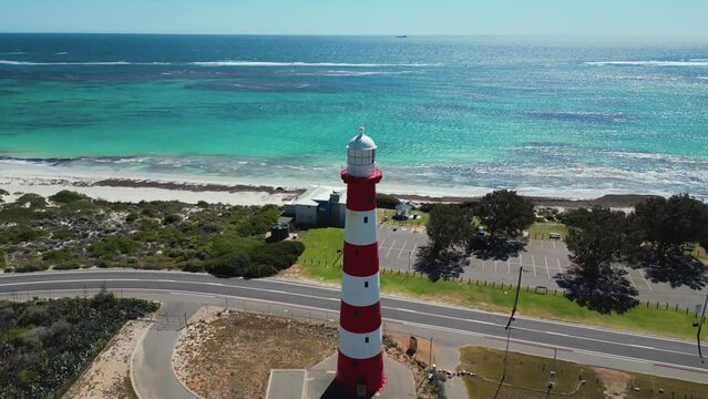 Picturesque red and white Point Moore Lighthouse in Geraldton, Perth. Aerial