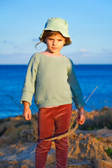 portrait of a child on the beach in cyprus