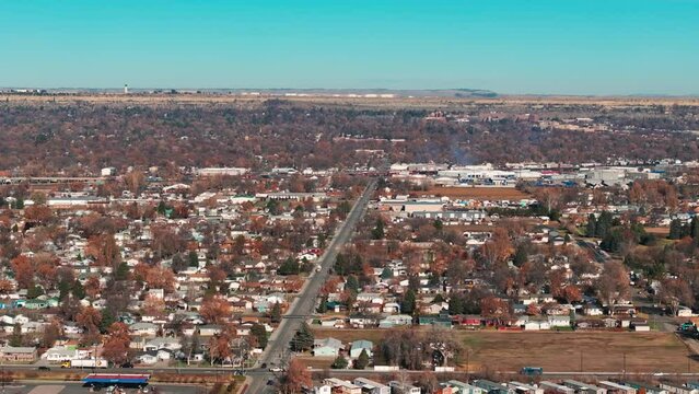 Captivating aerial perspective of Billings, Montana, bathed in sunlight, captured by a drone