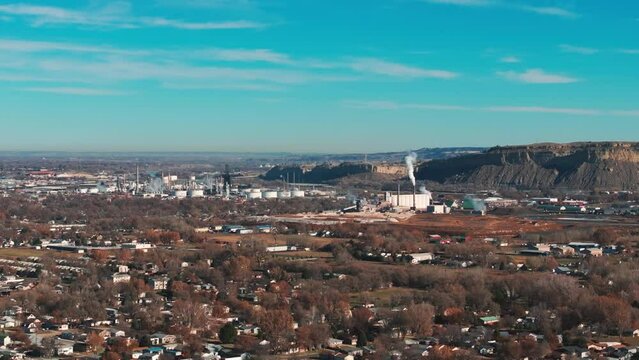 Drone aerial view of petroleum plants in Billings Montana with mountains