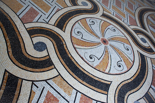 Mosaic arabesques on the floor of a Parisian building