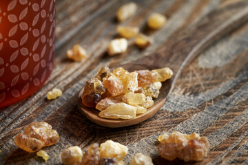 A wooden spoon with frankincense resin