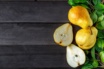 Ripe pears.Freshly harvested pears on old wooden background.Vegetarian, vegan, healthy diet food.