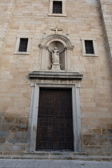 Fototapeta na wymiar Cebreros, Avila, Spain, November 28, 2023: Main door of the Santiago Apostol Church, 16th century, in the town of Cebreros, Avila, Spain