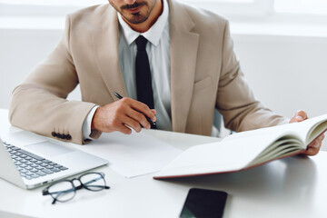 Man businessman plan pen desk office document business write hands adult suit