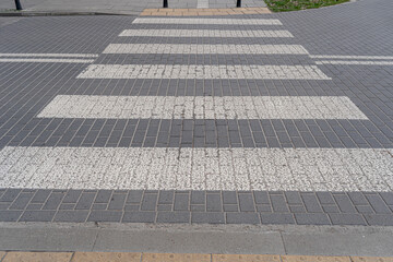 Obraz premium Paved Pedestrian Crossing, Grey White Crosswalk, Safety Zebra on Modern Tiles Pathway