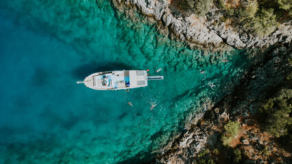 Amazing aerial view of mediterranean bay with boat.	