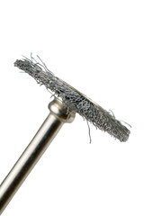 Macro of a metal wire drill isolated in white