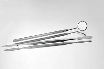 Dentist tools on white background