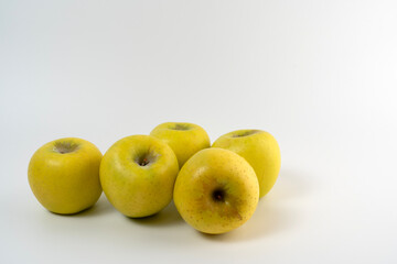 gold apples on white background