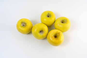 gold apples on a white background