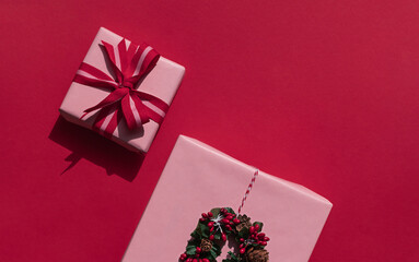 Christmas or New Year pink gift boxes concept composition. Winter holiday greeting card. Top view....