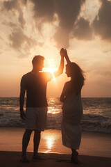 Full length silhouettes of perfect couple in love together dancing at tropic sea sunset. Man and woman holding hands posing on seascape outdoors. Summer vacation lifestyle concept. Copy ad text space