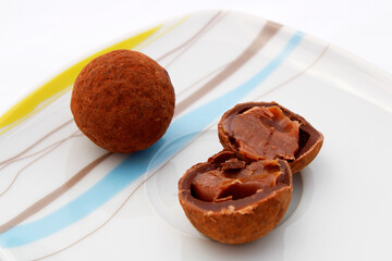Tasty chocolate bonbons filled with caramel