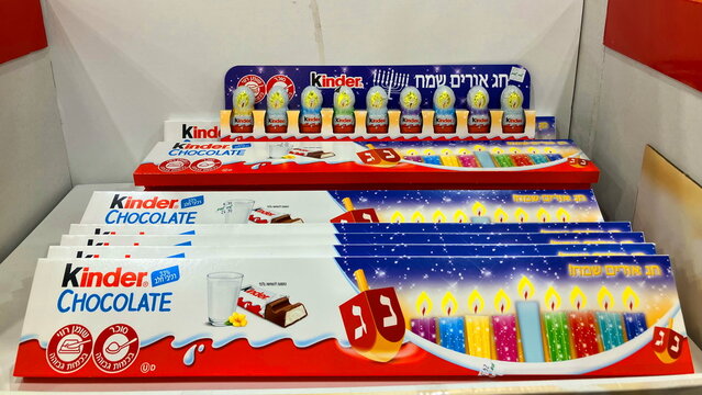 Hanukkah sweets from Ferrero. Kinder chocolate with Hanukkiah, Menorah, milk chocolate in the form of a candle. Limited edition of Ferrero sweets for Israel. 