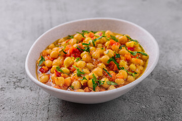 Cooked chickpeas in a white bowl