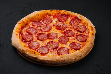 Pizza with pepperoni and parmesan