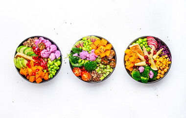 Vegan buddha bowls set with pumpkin, quinoa, tomatoes, spinach, avocado, radish, soybeans, edamame,...