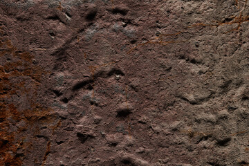 Brown stone texture, dark abstract background. Natural mineral rock close up details, empty backdrop with copy space for design