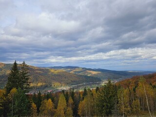 Autumn in the mountains. View of the forest and mountains. Panorama in the Carpathians Ukraine
