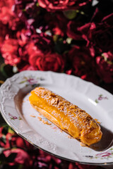 French Artisan Eclair on plate top view
