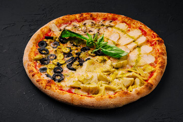 Four varieties of pizza top view
