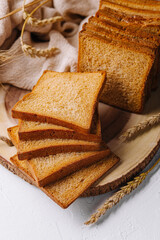 Board with slices of delicious toasted bread