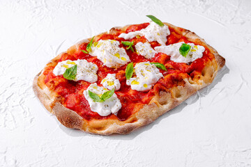 Pizza Margherita on white stone