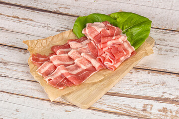 Sliced pork bacon in the bowl