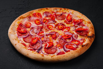 tasty pepperoni pizza with red chili pepper and onion