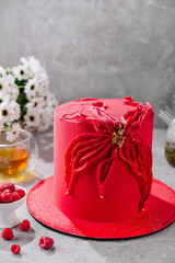 Contemporary raspberry mousse cake and tea