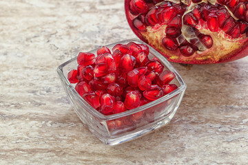 Ripe red Pomegranate seeds in the bowl