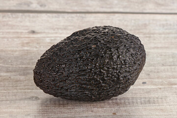 Fototapeta premium Ripe raw whole avocado fruit