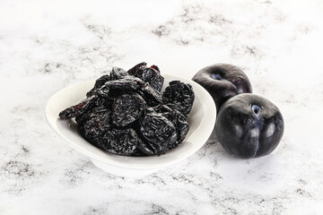 Dry prunes in thw bowl