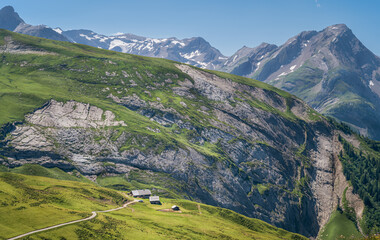 Fototapeta na wymiar Small farm somewhere in the Swiss Alps