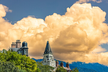 Amazing golden color, clear textured cloudscape and beautiful mountain top skyline view form a...