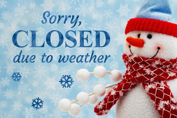 Sorry closed due to weather with a snowman with snowflakes