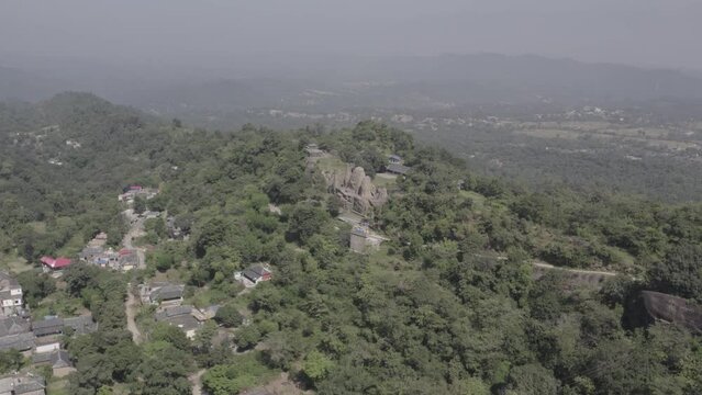 Drone shot of 8th century old rock cut temple in Kangra, Himacha Pradesh