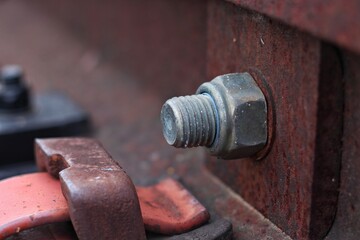 High resolution rusty bolts and screws on abandoned railroad train track